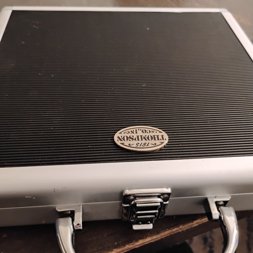 Thompson Black and Silver Binder
